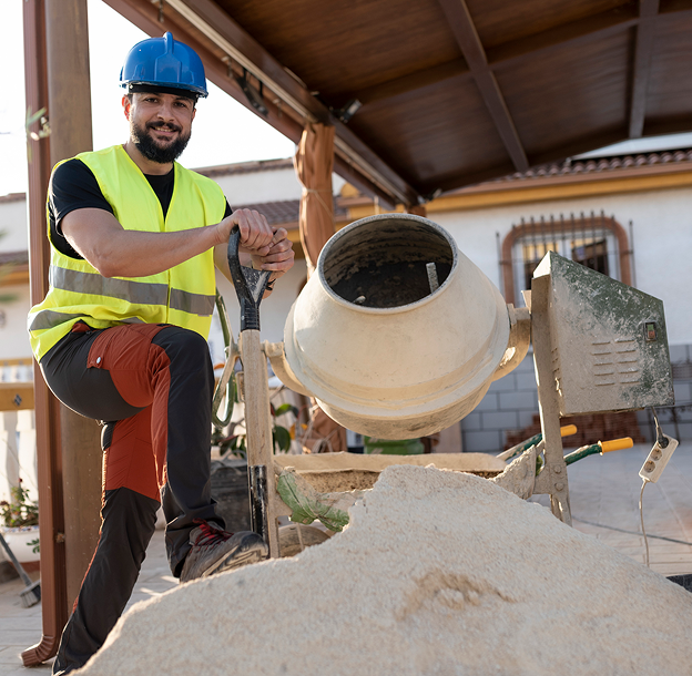 Man in safety gear at construction site