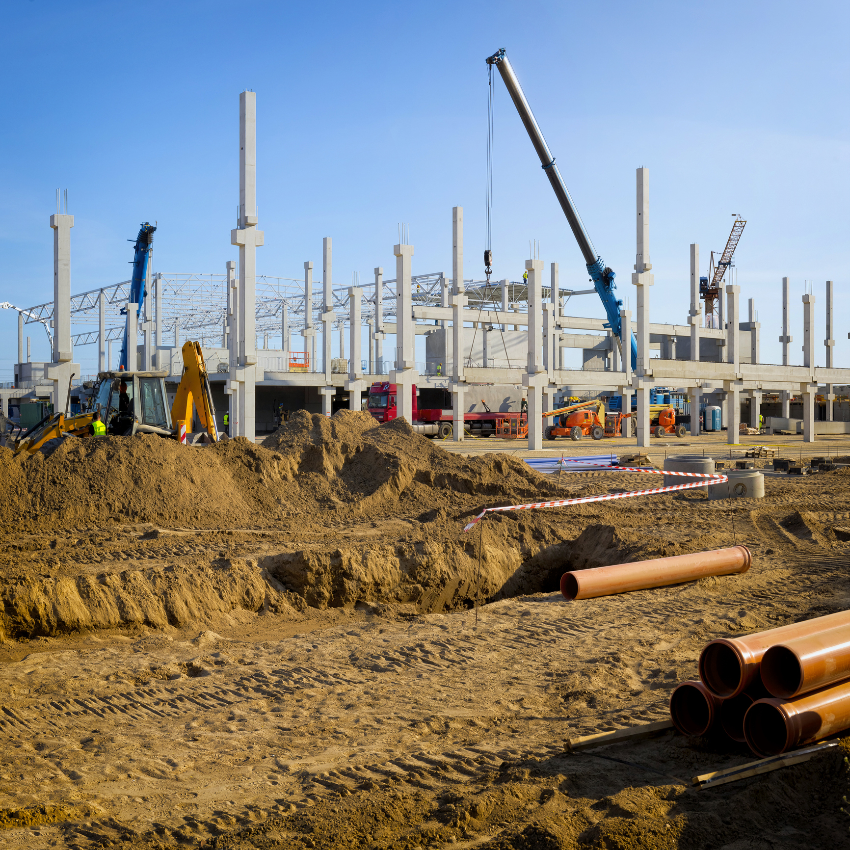 Industrial construction site under blue sky
