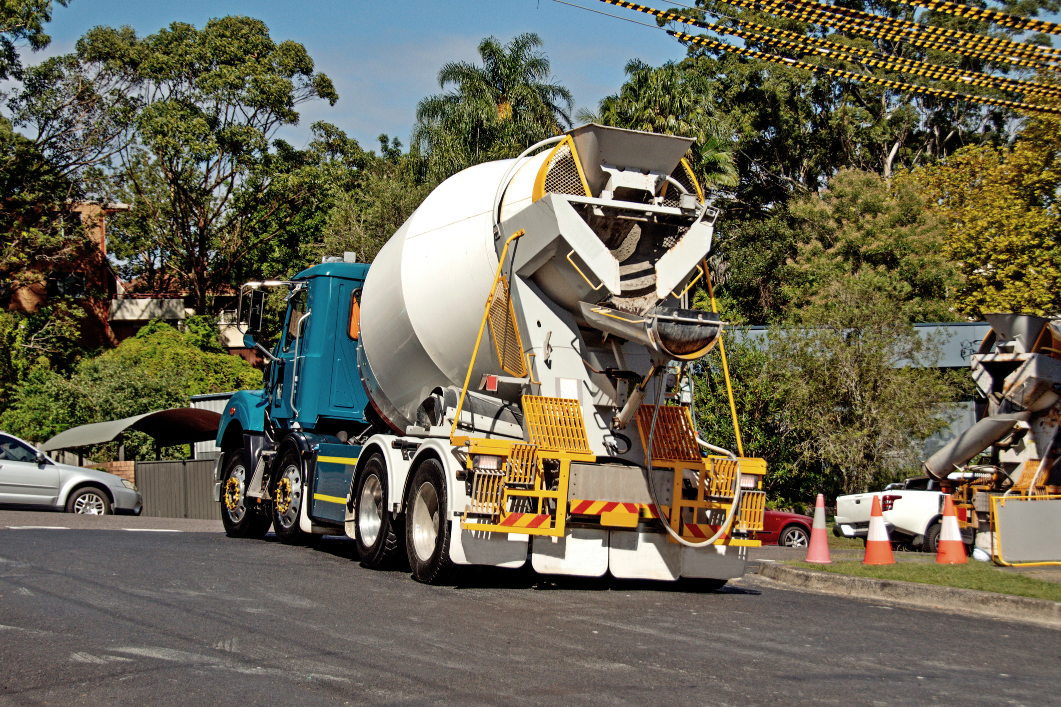 Concrete mixer truck on sunny day