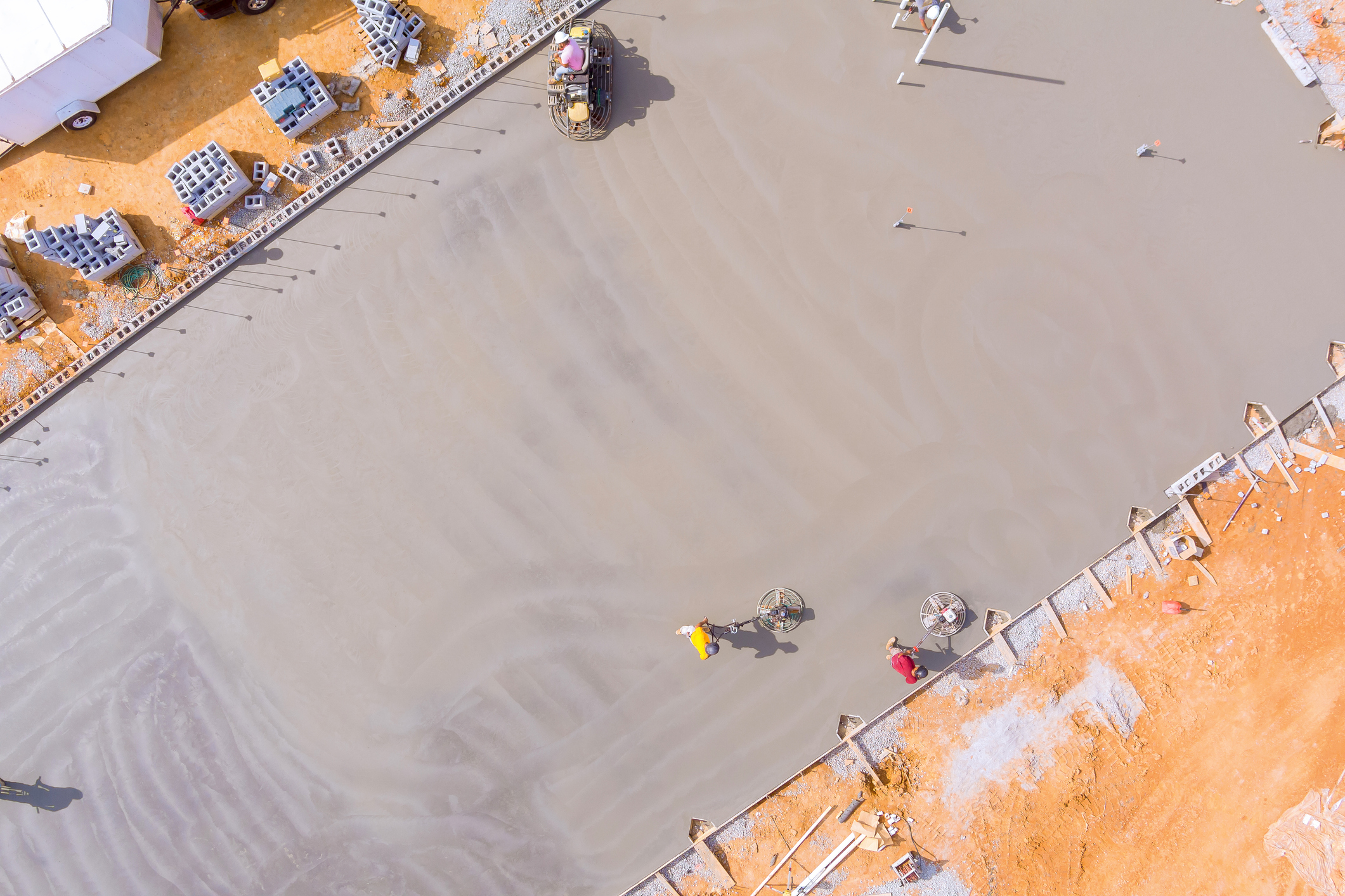 Construction site with fresh concrete slab