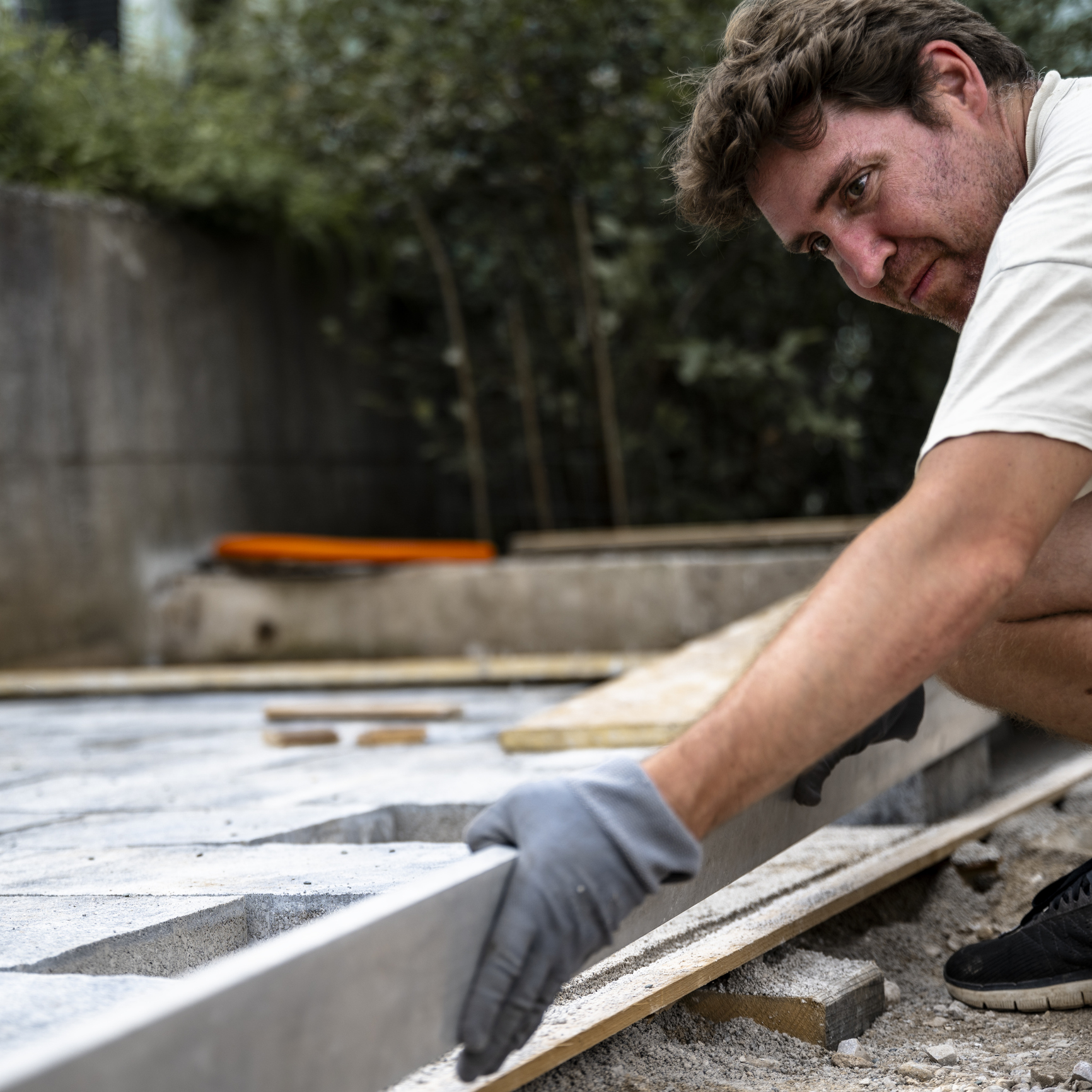 Man working on outdoor pavement construction