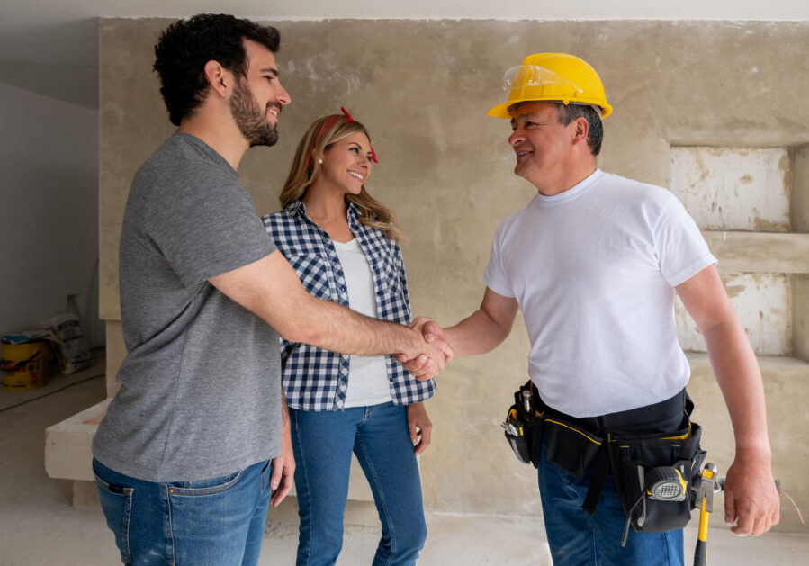 Home renovation handshake moment