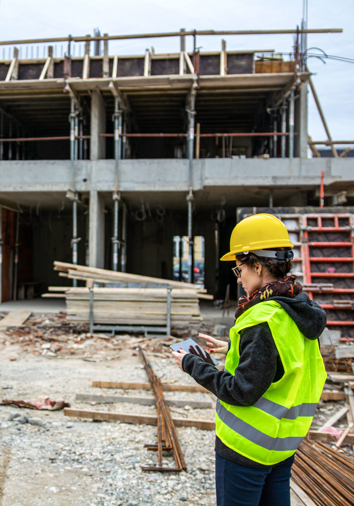 Engineer inspecting construction progress