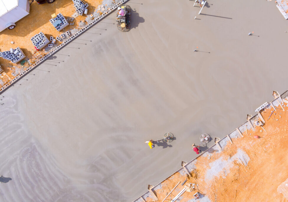 Construction site with fresh concrete slab