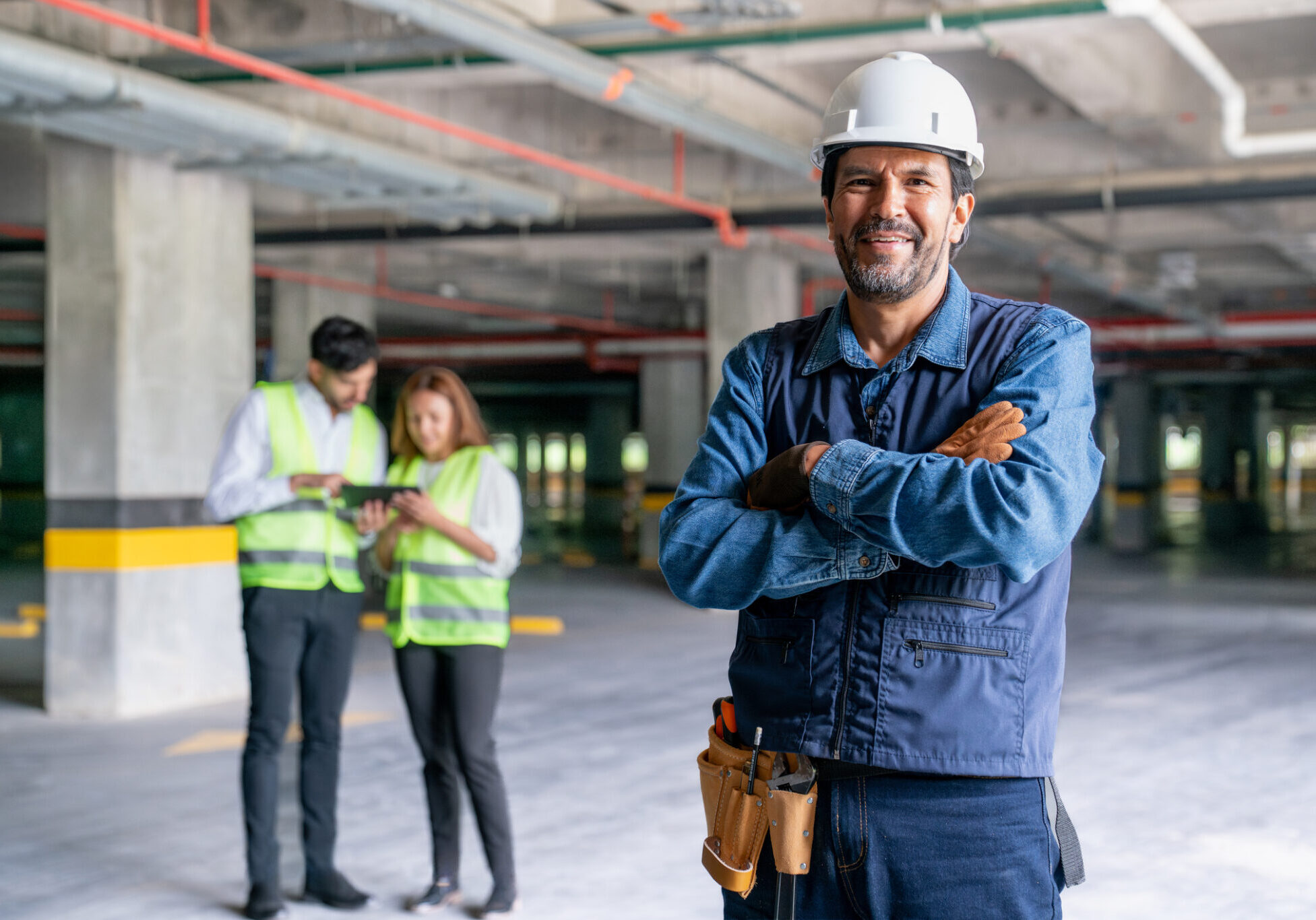 Engineer with arms crossed in construction site